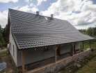 Plechová střecha Ruukki Finnera imitující klasickou taškovou krytinu na domě klempíře Pavla