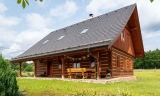 Tradiční roubenka s příběhem návratu domů