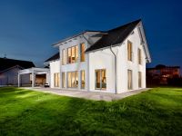 dřevostavba vzorový dům v noci