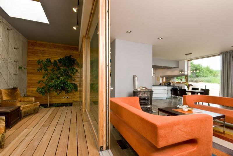 DrevoaStavby.cz | Dřevostavba zapuštěná do svahu